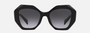 Prada PR 16WS 1AB5D1 irregular sunglasses for women in full rim acetate, with black frame, and grey gradient lenses. 53mm in lens size, 20mm in bridge size, and 145mm in temple length.