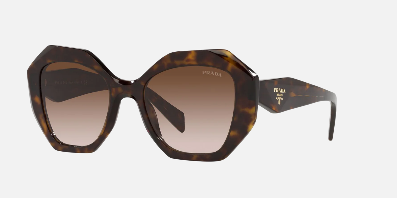 Prada PR 16WS 2AU6S1 irregular sunglasses for women in full rim acetate, with havana frame, and brown gradient lenses. 53mm in lens size, 20mm in bridge size, and 145mm in temple length.