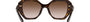 Prada PR 16WS 2AU6S1 irregular sunglasses for women in full rim acetate, with havana frame, and brown gradient lenses. 53mm in lens size, 20mm in bridge size, and 145mm in temple length.