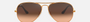 Ray-Ban Aviator Gradient RB3025 9001A5 aviator sunglasses for unisex in full rim metal, with light brown frame, and pink gradient brown lenses. 55mm in lens size, 14mm in bridge size, and 140mm in temple length.