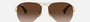 Ray-Ban RB3449 001/13 pilot sunglasses for unisex in semi-rimless metal, with arista gold frame, and brown gradient lenses. 59mm in lens size, 14mm in bridge size, and 135mm in temple length.