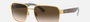 Ray-Ban RB3530 001/13 square sunglasses for unisex in full rim metal, with gold frame, and brown gradient lenses. 58mm in lens size, 17mm in bridge size, and 140mm in temple length.