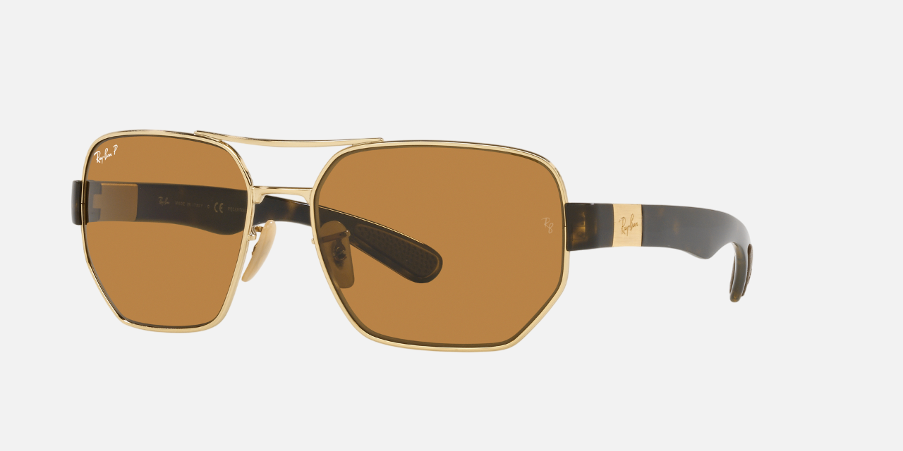Ray-Ban RB3672 001/83 rectangular sunglasses for unisex in full rim metal, with gold frame, and brown lenses. 60mm in lens size, 17mm in bridge size, and 135mm in temple length.