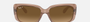 Ray-Ban RB4389 6644M2 pillow sunglasses for women in full rim plastic, with transparent brown frame, and brown lenses. 55mm in lens size, 17mm in bridge size, and 135mm in temple length.
