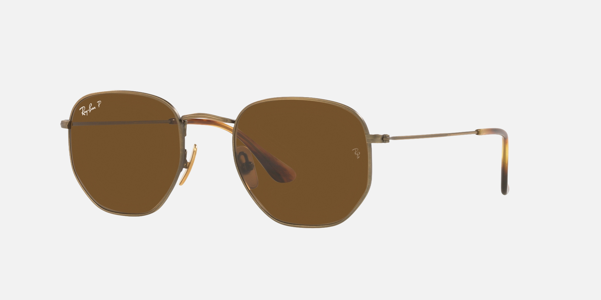 Ray-Ban hexagonalal Titanium RB8148 920757 unisex's full rim hexagonal sunglasses in a polished gold titanium frame with brown polarized lenses. Features a 51 mm lens size, 21 mm bridge size, and 145 mm temple length. Available in Dubai, UAE.