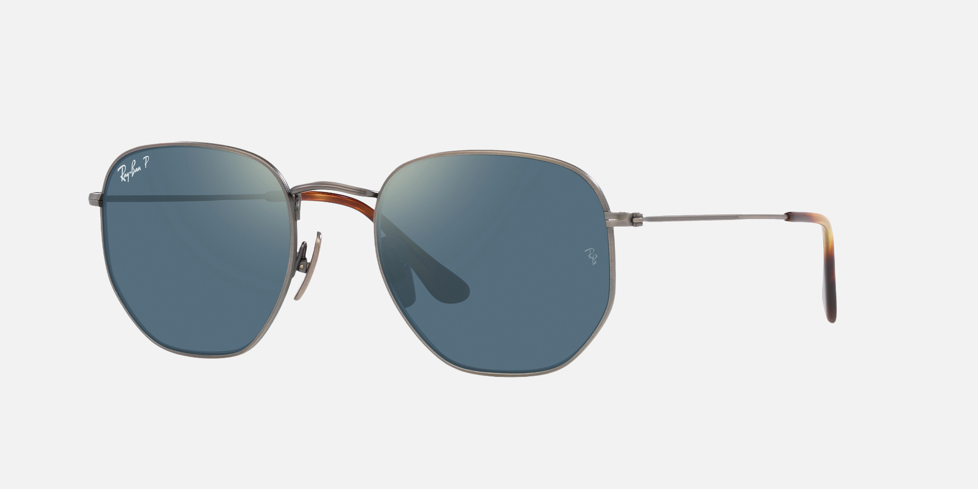 Ray-Ban hexagonalal Titanium RB8148 9208T0 unisex's full rim hexagonal sunglasses in a polished gunmetal titanium frame with polarized blue mirror gold
 lenses. Features a 54 mm lens size, 21 mm bridge size, and 145 mm temple length. Available in Dubai, UAE.