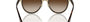 Versace VE2198 125213 round sunglasses for women in full rim metal, with havana frame, and brown gradient dark brown lenses. 54mm in lens size, 20mm in bridge size, and 145mm in temple length.