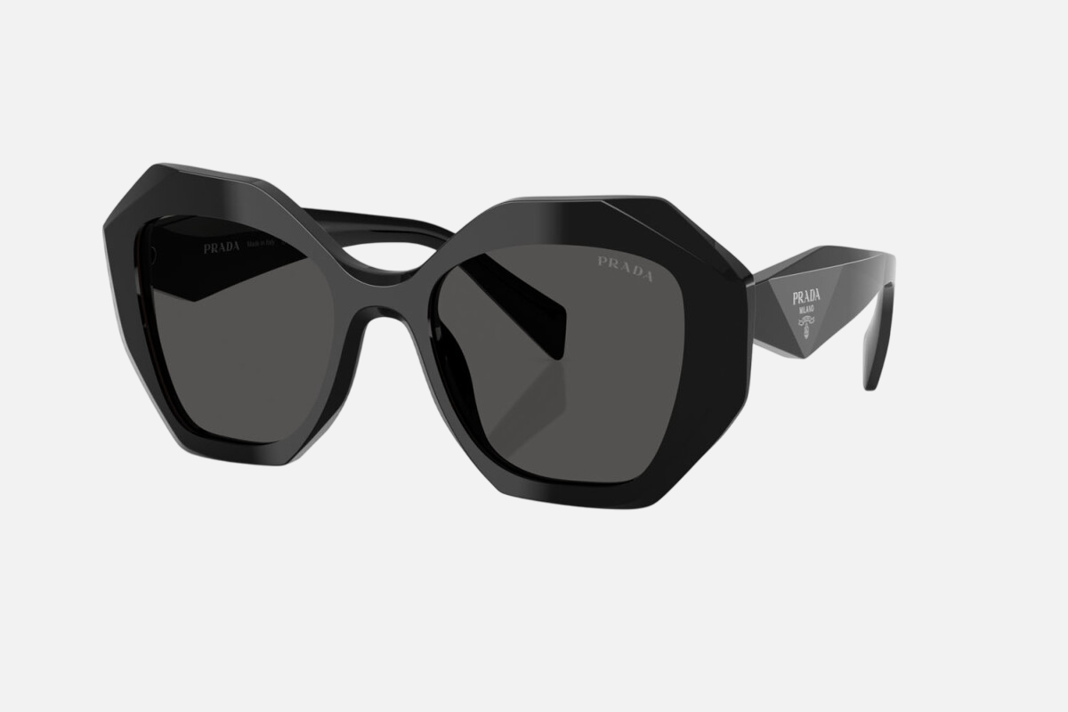 Prada PR 16WS 1AB5S0 irregular sunglasses for women in full rim acetate, with black frame, and dark grey lenses. 53mm in lens size, 20mm in bridge size, and 145mm in temple length.
