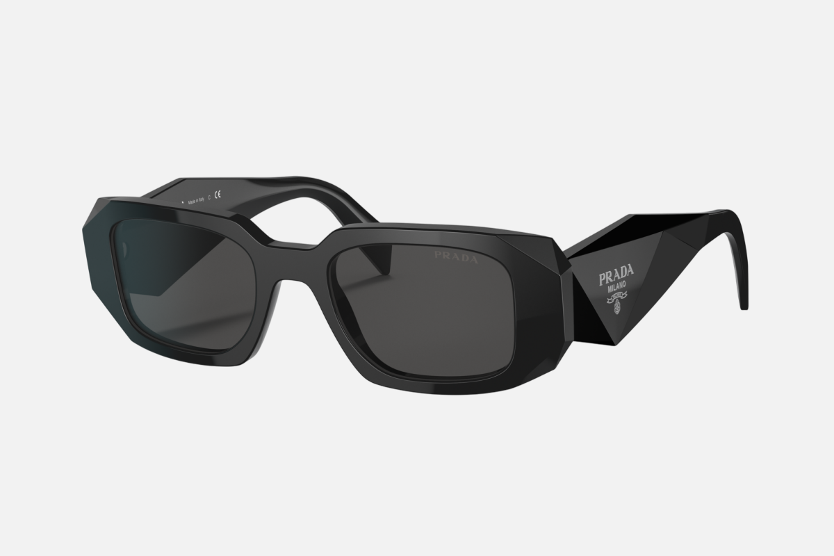 Prada PR 17WS 1AB5S0 rectangular sunglasses for women in full rim acetate, with black frame, and dark grey lenses. 49mm in lens size, 20mm in bridge size, and 145mm in temple length.