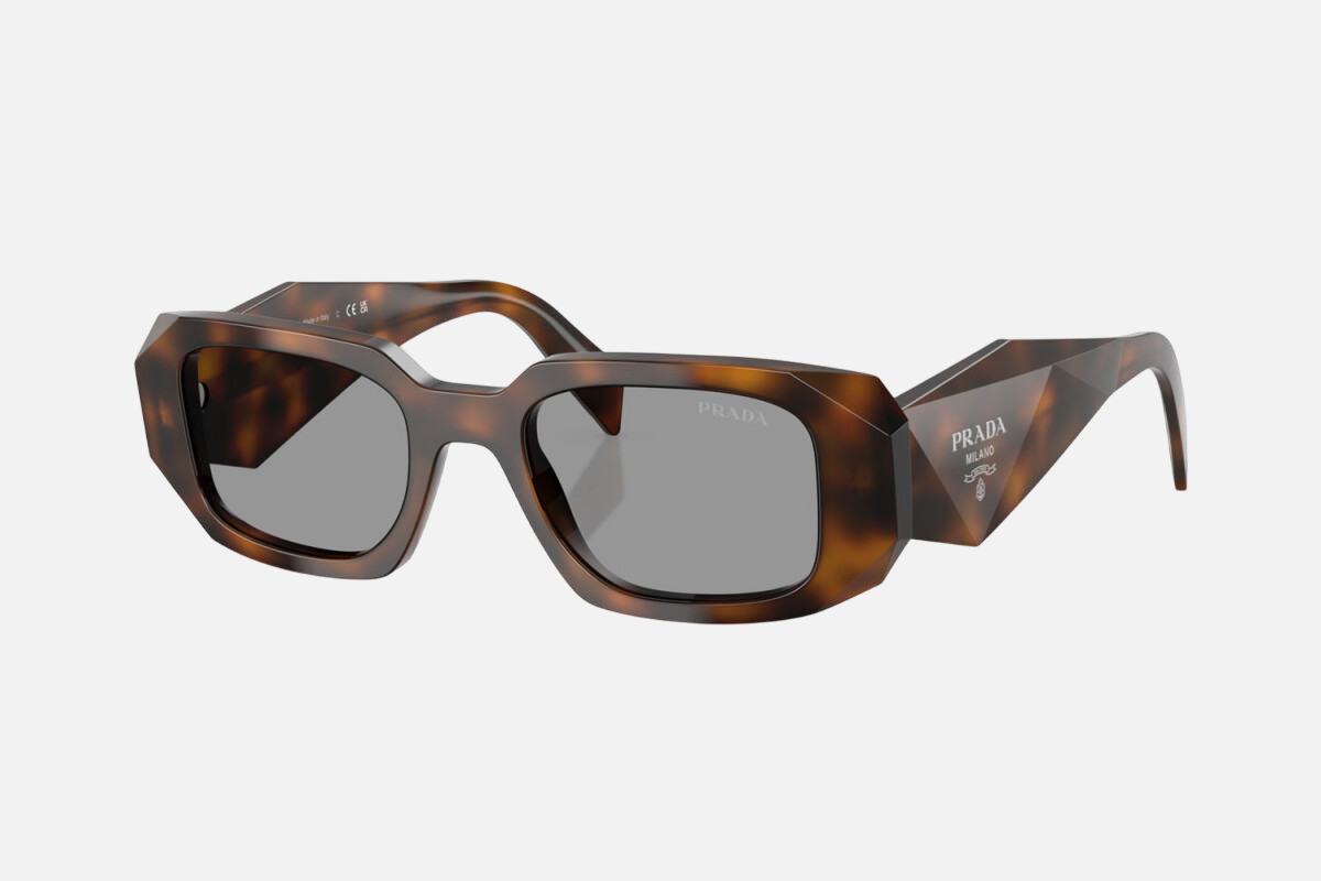 Prada PR 17WS 20D50Q rectangular sunglasses for women in full rim acetate, with havana frame, and grey lenses. 49mm in lens size, 20mm in bridge size, and 145mm in temple length.