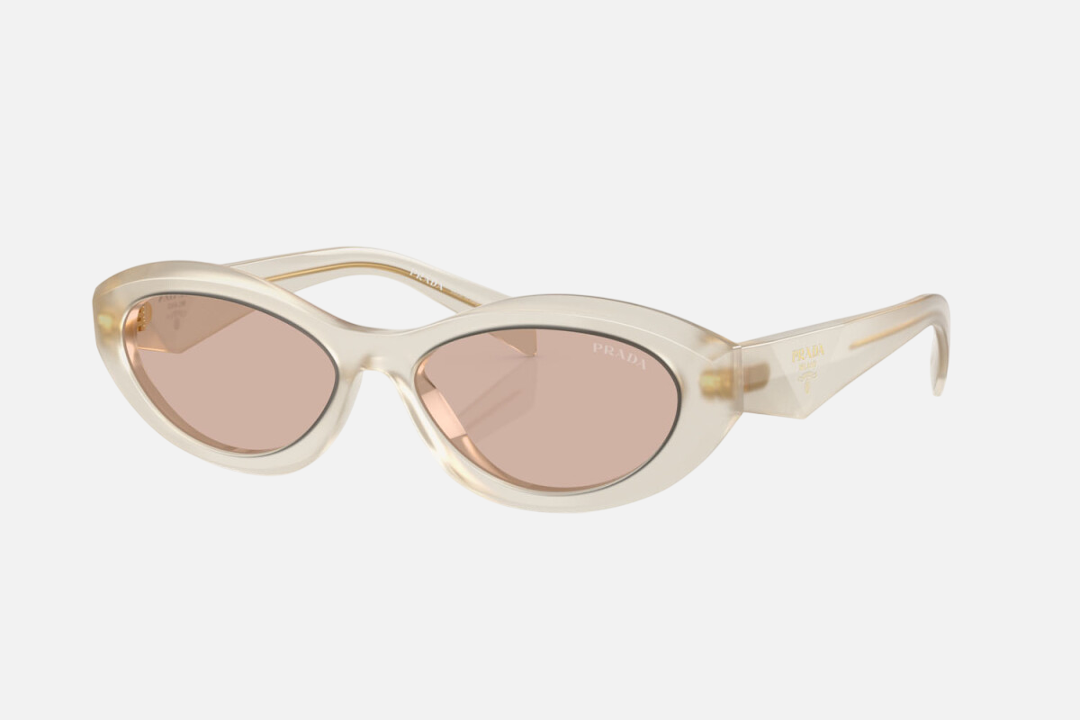 Prada PR 26ZS 12V4I2 oval sunglasses for women in full rim acetate, with opal milk frame, and light brown lenses. 55mm in lens size, 16mm in bridge size, and 145mm in temple length.