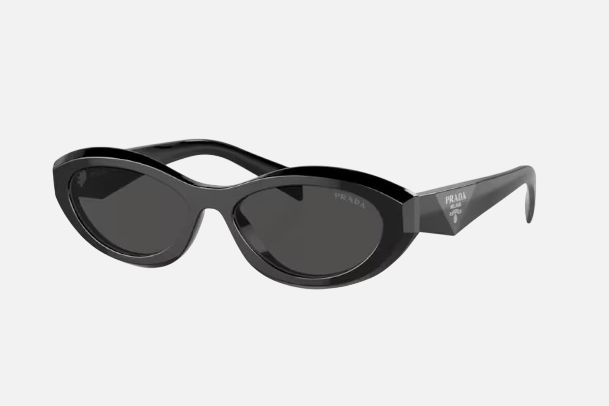 Prada PR 26ZS 16K08Z oval sunglasses for women in full rim acetate, with black frame, and dark grey lenses. 55mm in lens size, 16mm in bridge size, and 145mm in temple length.