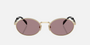 Prada PR 65ZS ZVN20I oval sunglasses for women in full rim metal, with pale gold frame, and light purple lenses. 55mm in lens size, 20mm in bridge size, and 140mm in temple length.