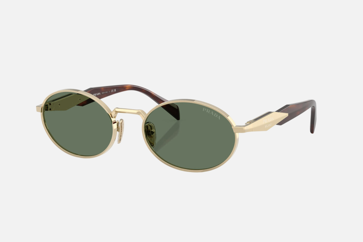 Prada PR 65ZS ZVN70L oval sunglasses for women in full rim metal, with pale gold frame, and dark green lenses. 55mm in lens size, 20mm in bridge size, and 140mm in temple length.