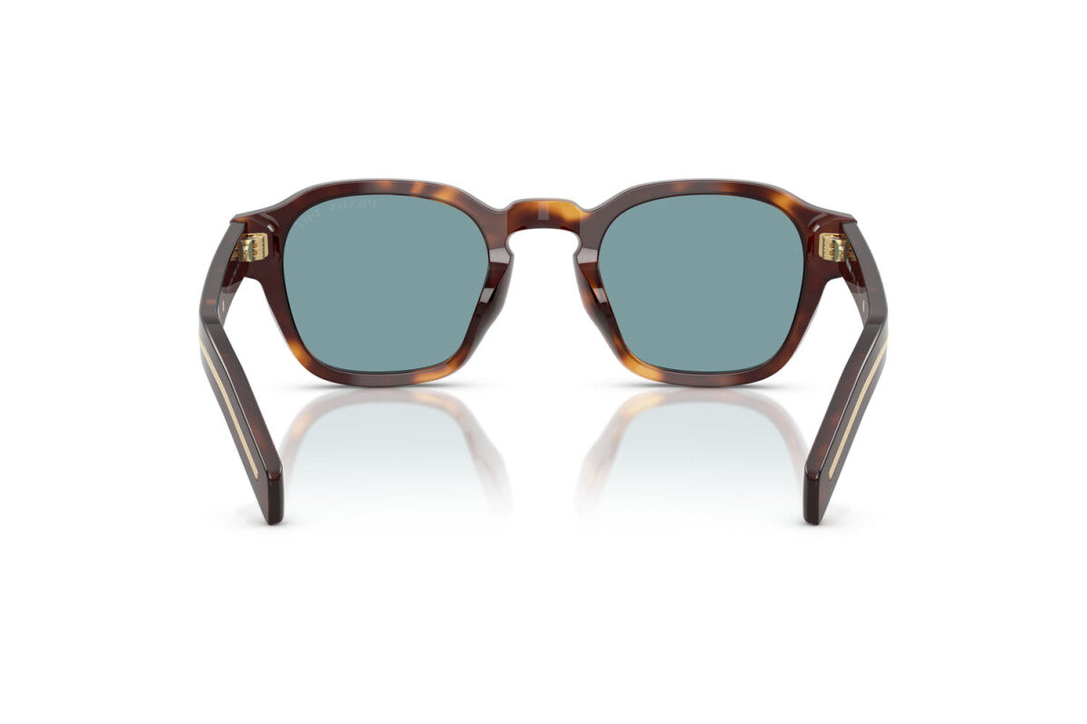 Prada PR A16S 15W04D round sunglasses for men in full rim acetate, with havana frame, and blue green lenses. 49mm in lens size, 24mm in bridge size, and 145mm in temple length.