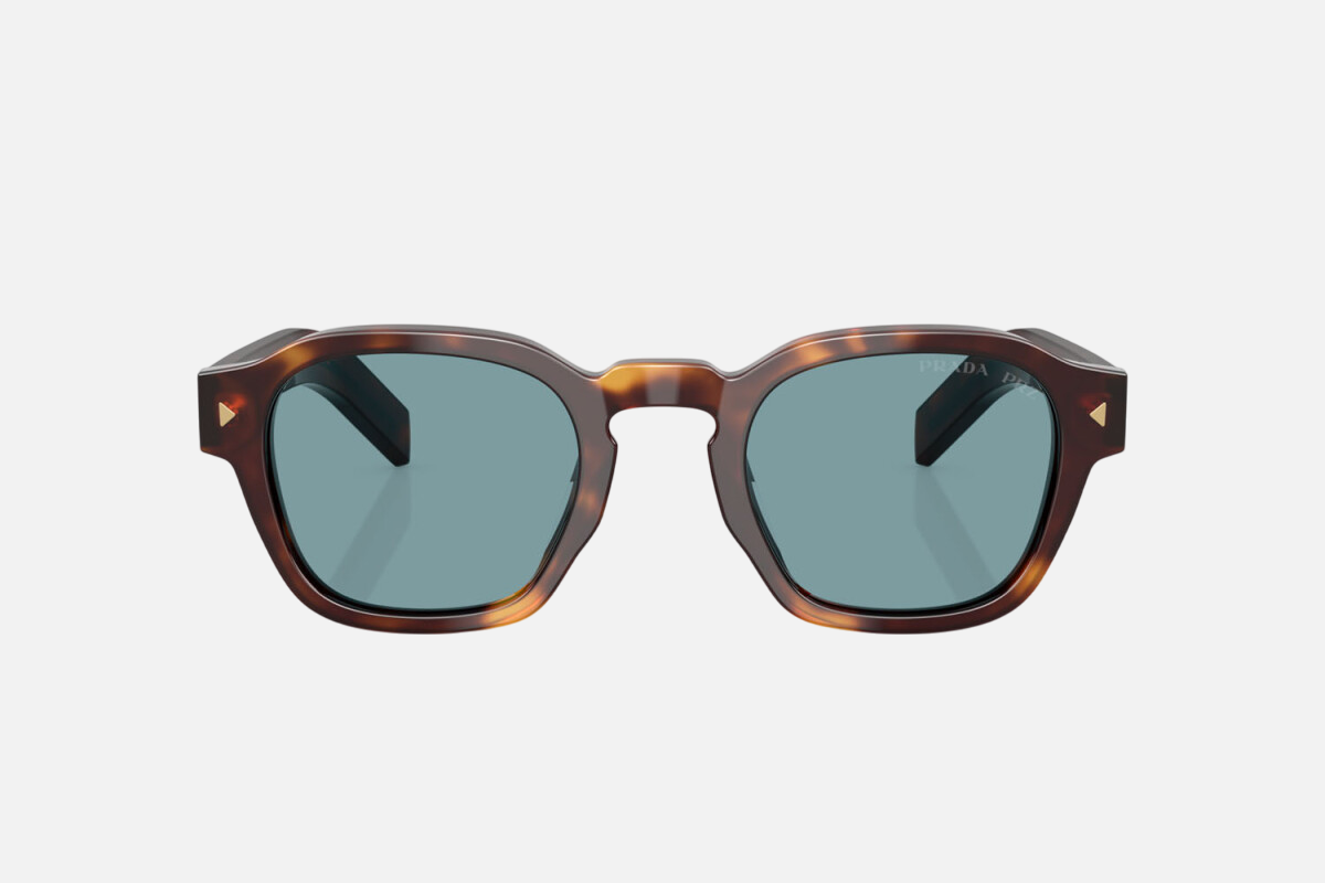 Prada PR A16S 15W04D round sunglasses for men in full rim acetate, with havana frame, and blue green lenses. 49mm in lens size, 24mm in bridge size, and 145mm in temple length.