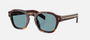 Prada PR A16S 15W04D round sunglasses for men in full rim acetate, with havana frame, and blue green lenses. 49mm in lens size, 24mm in bridge size, and 145mm in temple length.
