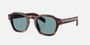 Prada PR A16S 15W04D round sunglasses for men in full rim acetate, with havana frame, and blue green lenses. 49mm in lens size, 24mm in bridge size, and 145mm in temple length.