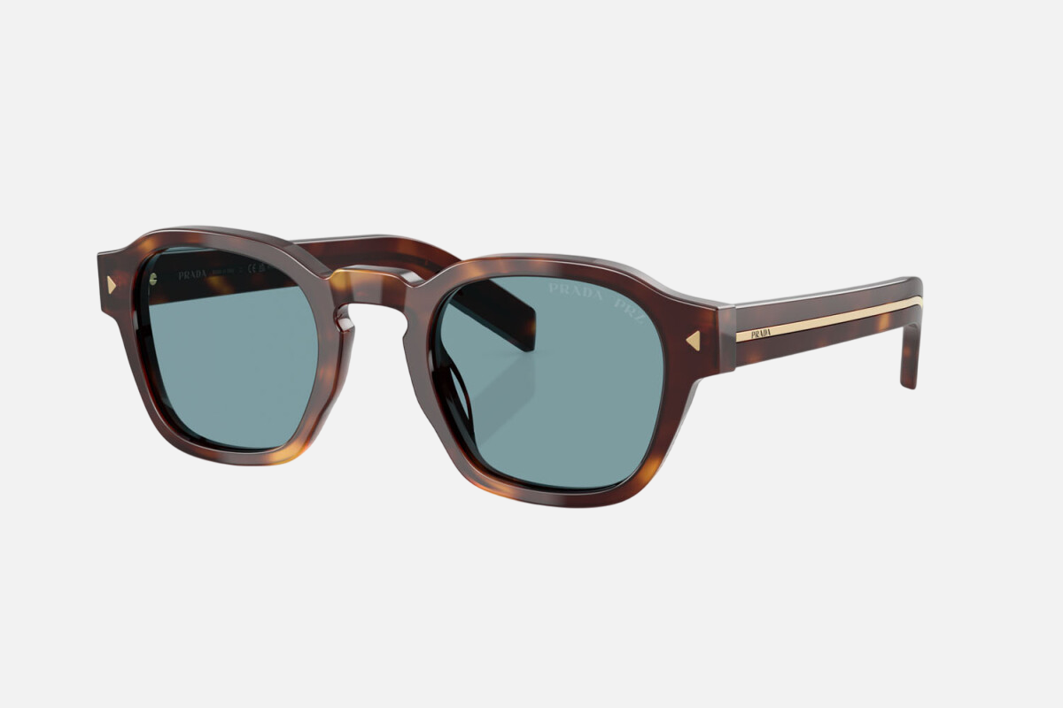 Prada PR A16S 15W04D round sunglasses for men in full rim acetate, with havana frame, and blue green lenses. 49mm in lens size, 24mm in bridge size, and 145mm in temple length.