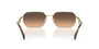 Prada PR A51S ZVN50C irregular sunglasses for women in full rim metal, with pale gold frame, and brown with grey gradient lenses. 58mm in lens size, 17mm in bridge size, and 140mm in temple length.