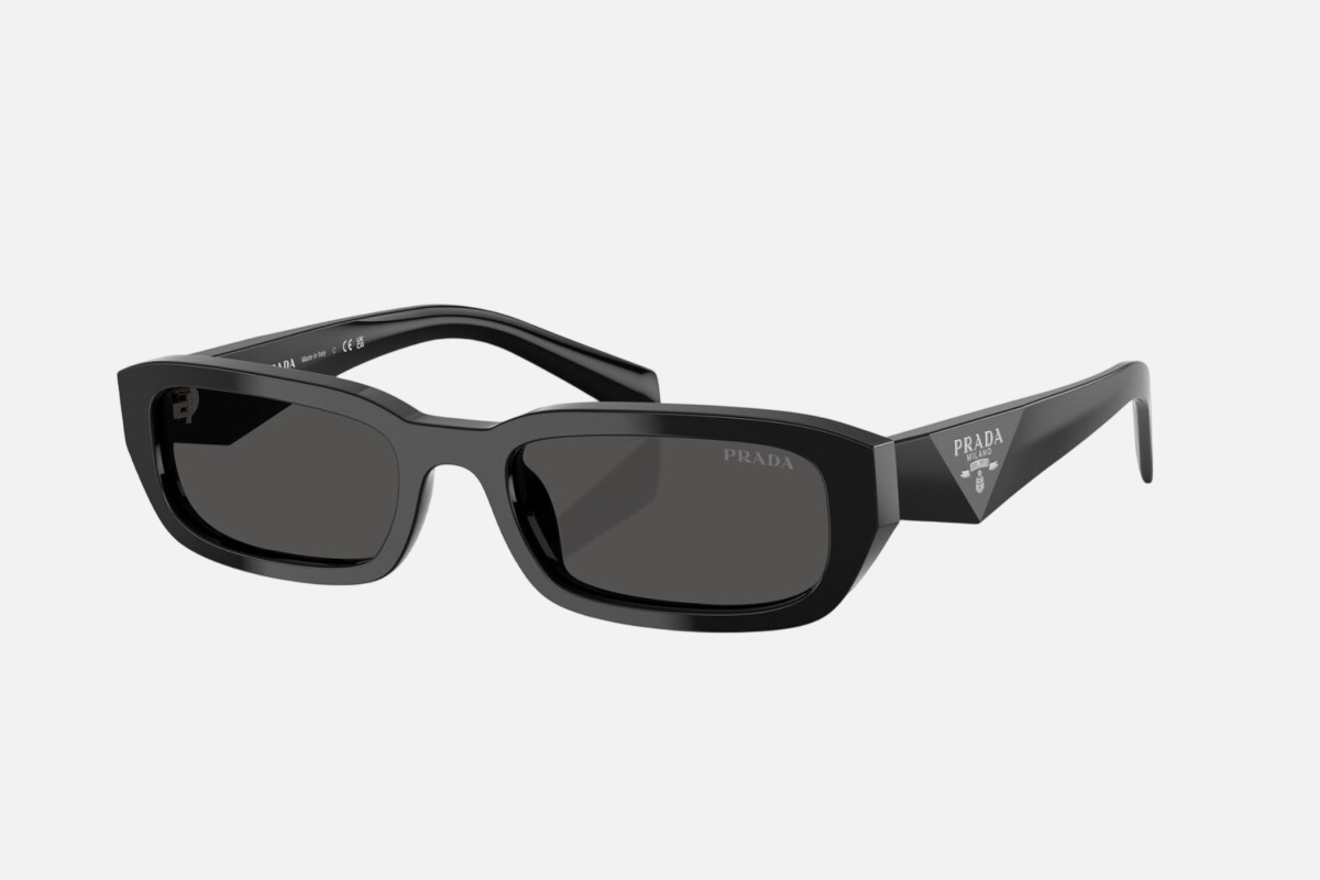 Prada PR B06S 16K08Z rectangular sunglasses for women in full rim acetate, with black frame, and dark grey lenses. 53mm in lens size, 19mm in bridge size, and 145mm in temple length.