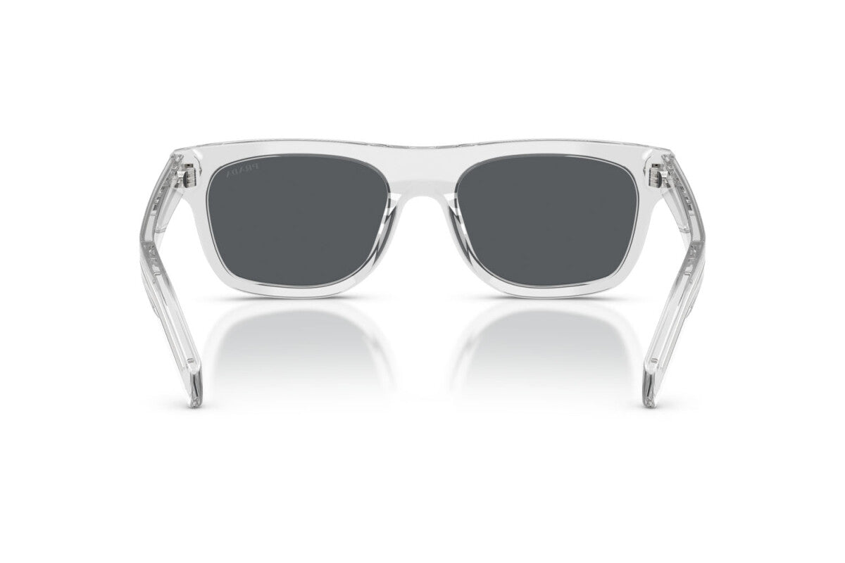 Prada PR B12S 12R07T square sunglasses for men in full rim acetate, with transparent grey frame, and dark blue lenses. 55mm in lens size, 19mm in bridge size, and 145mm in temple length.
