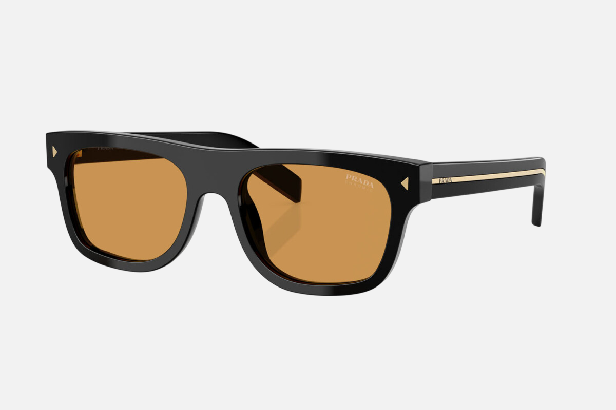 Prada PR B12S 16K60F square sunglasses for men in full rim acetate, with black frame, and photochromic brown lenses. 55mm in lens size, 19mm in bridge size, and 145mm in temple length.