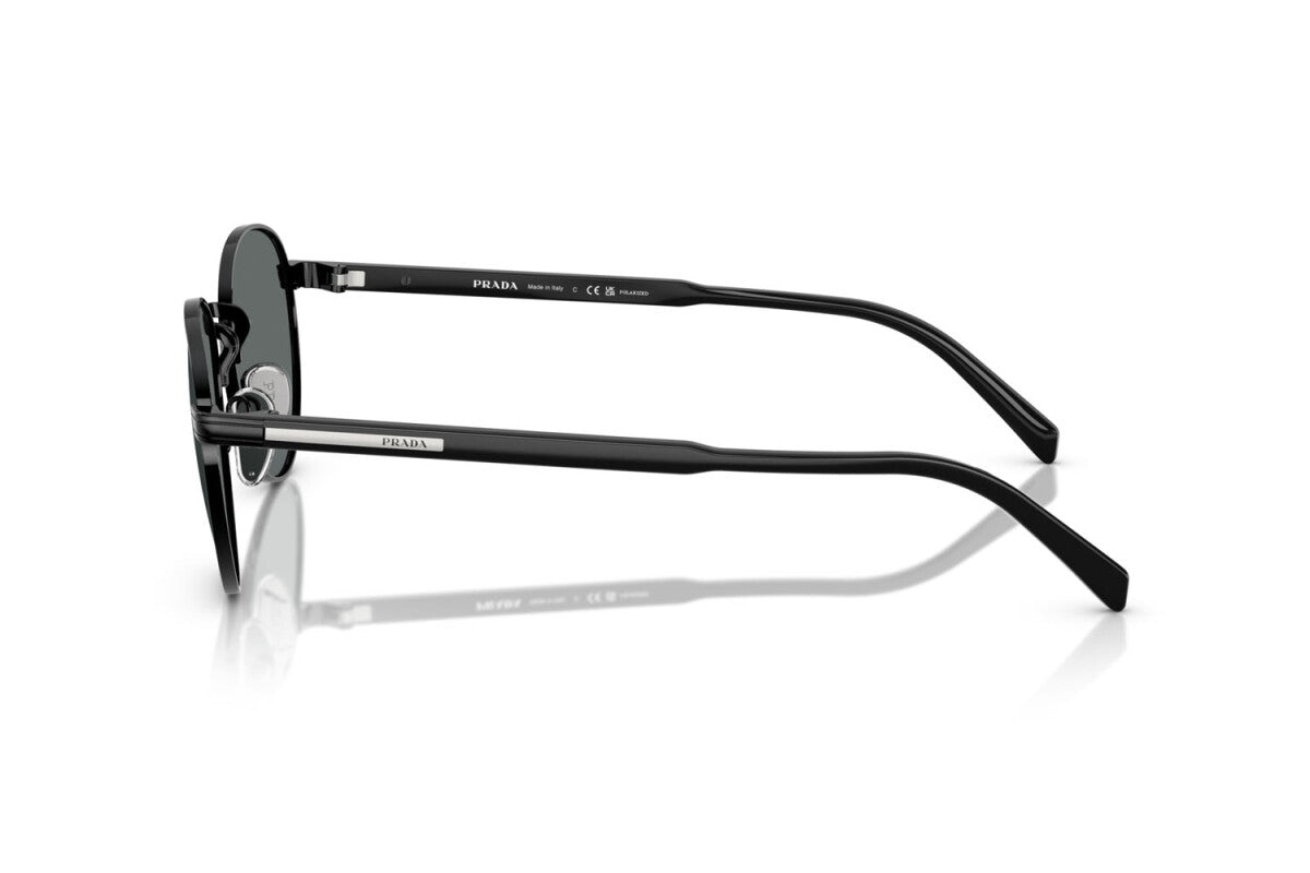 Prada PR B51S 1AB5Z1 oval sunglasses for men in full rim metal, with glossy black frame, and black lenses. 53mm in lens size, 21mm in bridge size, and 145mm in temple length.