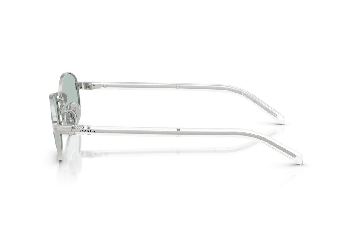 Prada PR B53S 1BC40N oval sunglasses for women in full rim steel, with silver frame, and sky blue lenses. 49mm in lens size, 21mm in bridge size, and 145mm in temple length.