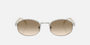 Prada PR B53S 1BC80K oval sunglasses for women in full rim steel, with silver frame, and light yellow with brown lenses. 52mm in lens size, 21mm in bridge size, and 145mm in temple length.