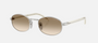 Prada PR B53S 1BC80K oval sunglasses for women in full rim steel, with silver frame, and light yellow with brown lenses. 52mm in lens size, 21mm in bridge size, and 145mm in temple length.
