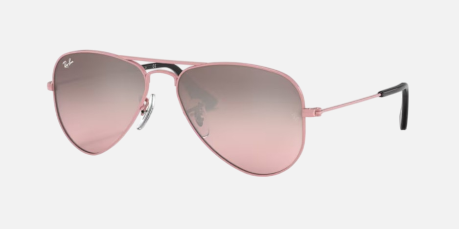 Ray-Ban Junior Aviator Kids RJ9506S 211/7E pilot sunglasses for kids in full rim metal, with polished pink frame, and pink lenses. 52mm in lens size, 14mm in bridge size, and 125mm in temple length.