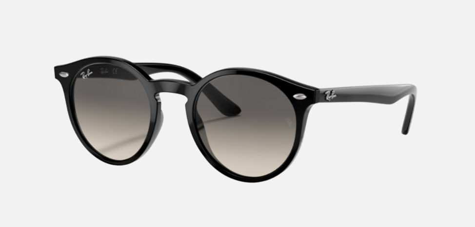 Ray-Ban Junior RJ9064S 100/11 phantos sunglasses for kids in full rim injected, with polished black frame, and light grey/dark grey lenses. 44mm in lens size, 19mm in bridge size, and 130mm in temple length.