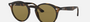 Ray-Ban RB2180 710/73 round sunglasses for unisex in full rim plastic, with light havana frame, and brown lenses. 49mm in lens size, 21mm in bridge size, and 145mm in temple length.