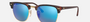 Ray-Ban Clubmaster Classic RB3016 114517 square sunglasses for unisex in full rim plastic, with havana on gold frame, and blue mirror lenses. 51mm in lens size, 21mm in bridge size, and 145mm in temple length.