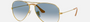 Ray-Ban Aviator Gradient RB3025 001/3F aviator sunglasses for unisex in full rim metal, with gold frame, and light blue lenses. 58mm in lens size, 14mm in bridge size, and 135mm in temple length.