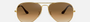 Ray-Ban Aviator Gradient RB3025 001/51 aviator sunglasses for unisex in full rim metal, with gold frame, and light brown lenses. 58mm in lens size, 14mm in bridge size, and 135mm in temple length.