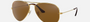 Ray-Ban Aviator Classic RB3025 001/57 aviator sunglasses for unisex in full rim metal, with gold frame, and brown lenses. 58mm in lens size, 14mm in bridge size, and 140mm in temple length.
