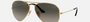 Ray-Ban Aviator Havana Collection RB3025 181/71 aviator sunglasses for unisex in full rim metal, with gold frame, and grey gradient lenses. 58mm in lens size, 14mm in bridge size, and 145mm in temple length.