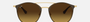 Ray-Ban RB3546 900985 round sunglasses for women in full rim metal, with brown frame, and brown gradient lenses. 52mm in lens size, 20mm in bridge size, and 145mm in temple length.