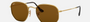 Ray-Ban Hexagonal Flat Lenses RB3548N 001/57 hexagonal sunglasses for unisex in full rim metal, with gold frame, and brown lenses. 51mm in lens size, 21mm in bridge size, and 145mm in temple length.