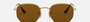 Ray-Ban Hexagonal Flat Lenses RB3548N 001/57 hexagonal sunglasses for unisex in full rim metal, with gold frame, and brown lenses. 54mm in lens size, 21mm in bridge size, and 145mm in temple length.