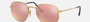 Ray-Ban Hexagonal Flat Lenses RB3548N 001/Z2 hexagonal sunglasses for unisex in full rim metal, with gold frame, and bronze lenses. 51mm in lens size, 21mm in bridge size, and 145mm in temple length.