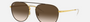 Ray-Ban RB3589 905513 round sunglasses for unisex in full rim metal, with brown on gold frame, and brown gradient dark brown lenses. 55mm in lens size, 18mm in bridge size, and 140mm in temple length.
