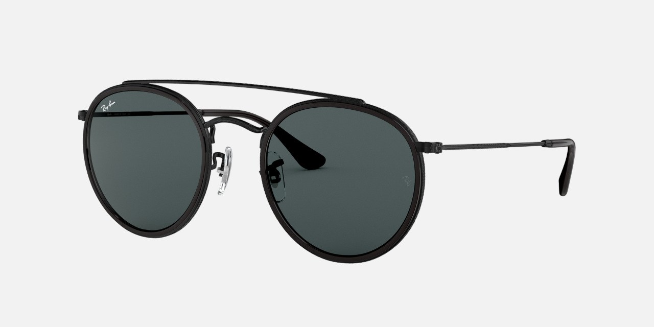 Ray-Ban Round Double Bridge RB3647N 002/R5 unisex's full rim round double bridge sunglasses in a black metal frame with grey lenses. Features a 51 mm lens size, 22 mm bridge size, and 145 mm temple length. Available in Dubai, UAE.