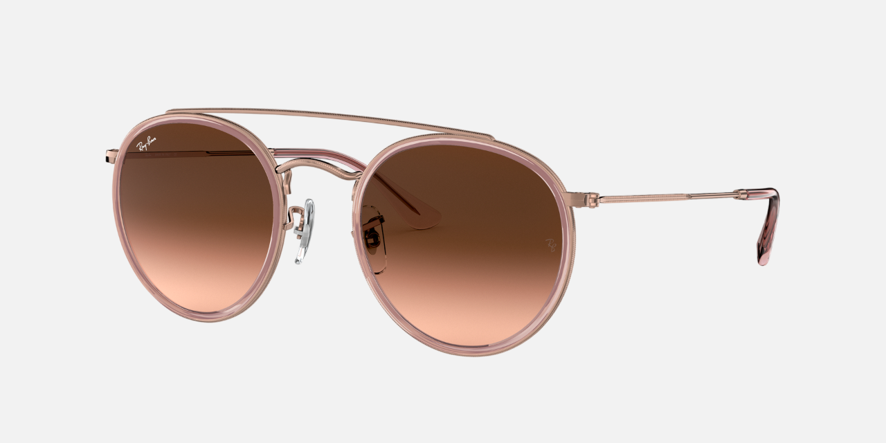Ray-Ban Round Double Bridge RB3647N 9069A5 unisex's full rim round double bridge sunglasses in a copper metal frame with brown gradient lenses. Features a 51 mm lens size, 22 mm bridge size, and 145 mm temple length. Available in Dubai, UAE.