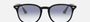 Ray-Ban RB4259 601/19 round sunglasses for unisex in full rim plastic, with black frame, and clear gradient light blue lenses. 51mm in lens size, 20mm in bridge size, and 145mm in temple length.