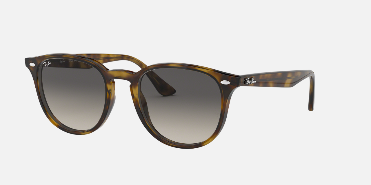 Ray-Ban RB4259 710/11 round sunglasses for unisex in full rim plastic, with light havana frame, and grey gradient lenses. 51mm in lens size, 20mm in bridge size, and 145mm in temple length.