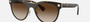 Versace VE2198 125213 round sunglasses for women in full rim metal, with havana frame, and brown gradient dark brown lenses. 54mm in lens size, 20mm in bridge size, and 145mm in temple length.