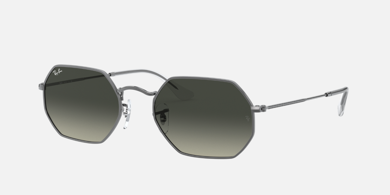 Ray-Ban Octagonal Classic RB3556N 004/71 octagonal sunglasses for unisex in full rim metal, with gunmetal frame, and grey gradient lenses. 53mm in lens size, 21mm in bridge size, and 145mm in temple length.